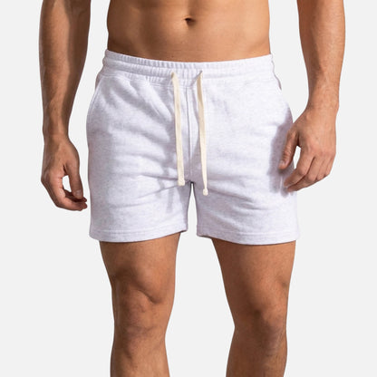 Shorts de forro polar con cordón y bolsillos para hombre