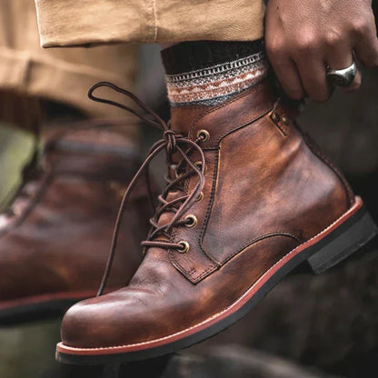 Botas de cuero con cordones y suela resistente para hombre