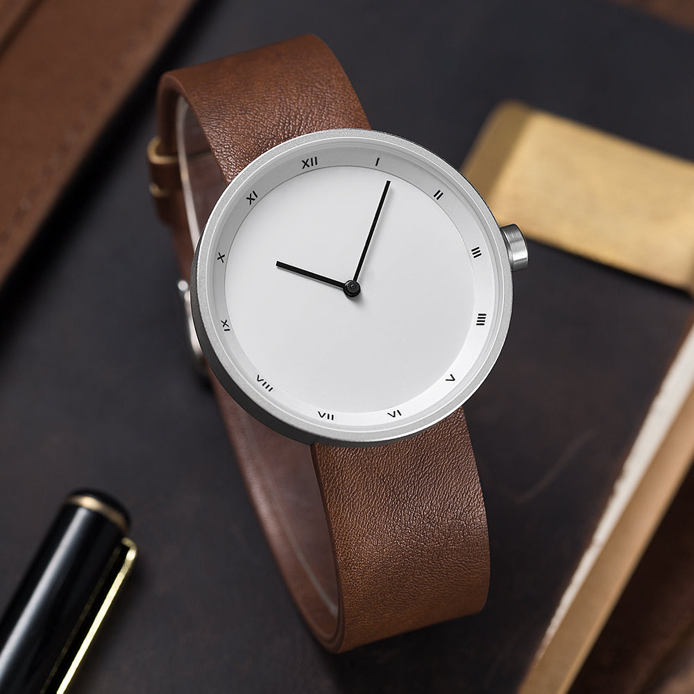 Reloj estilo minimalista nórdico con caja metálica para hombre