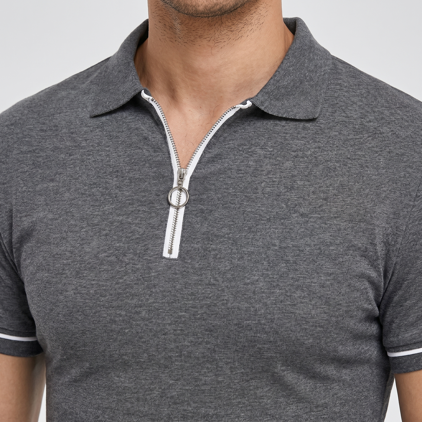 Polo ajustado de punto con cremallera para hombre