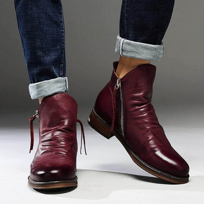 Botas de cuero liso con cremallera para hombre